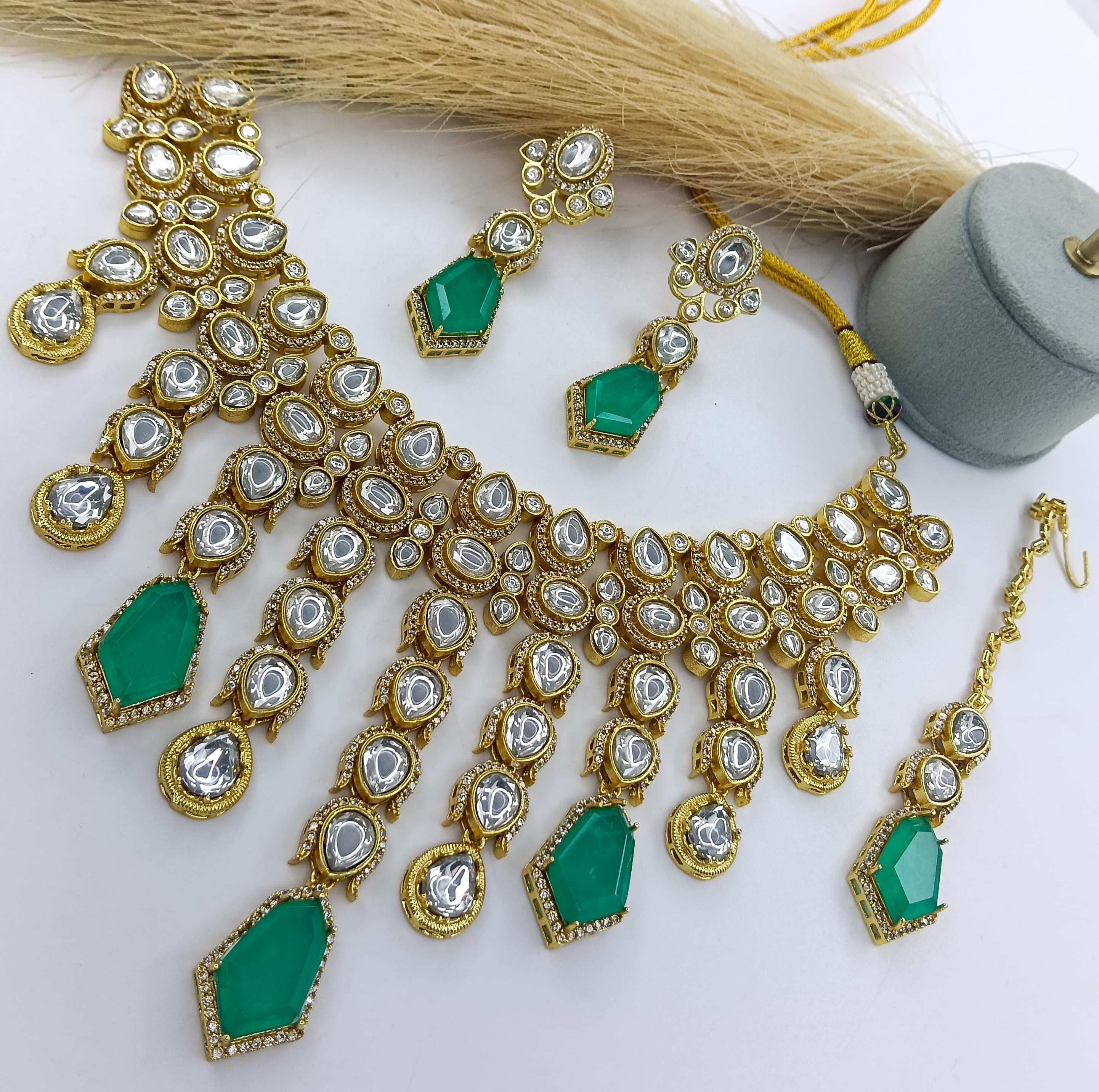 This is a Chrishan Alloy Gold-plated Green Jewel Set.