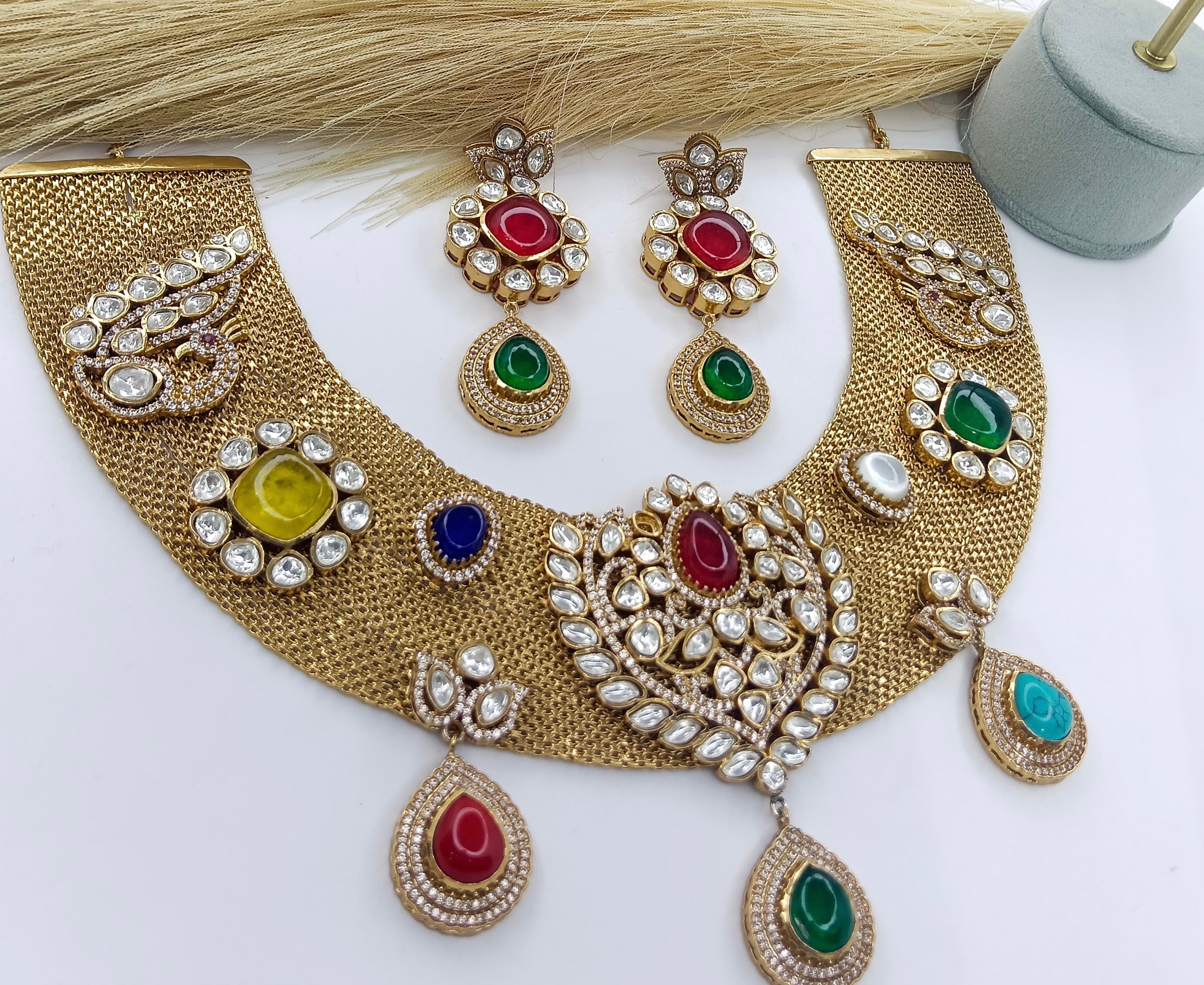 This is a Kundan jewelry set including a necklace and earrings.
