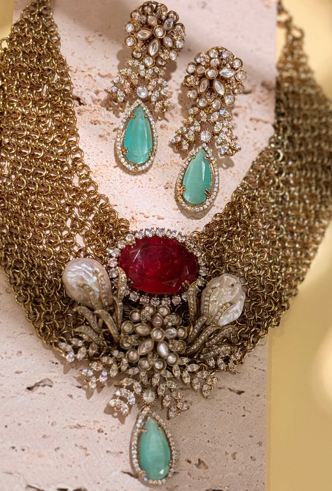 This is a piece of Polki jewelry, which is a type of traditional Indian jewelry made with uncut diamonds.